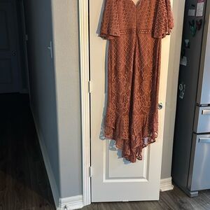 Elegant Lace Semi formal dress in Mauve is a stunning midi dress length dress